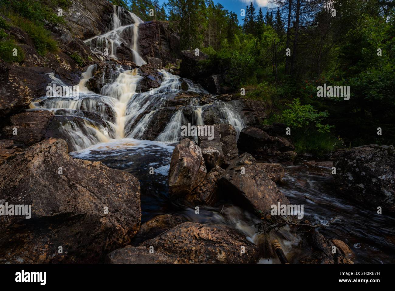 Elgafossen - Algafallet Waterfall located between two countries Sweden and Norway on Elja River Stock Photo