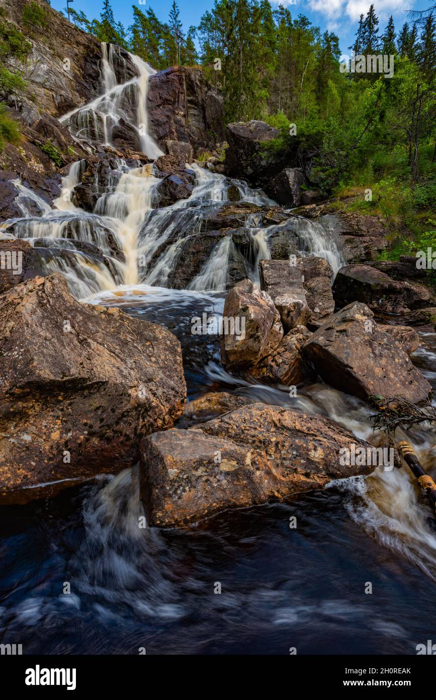 Elgafossen - Algafallet Waterfall located between two countries Sweden and Norway on Elja River Stock Photo