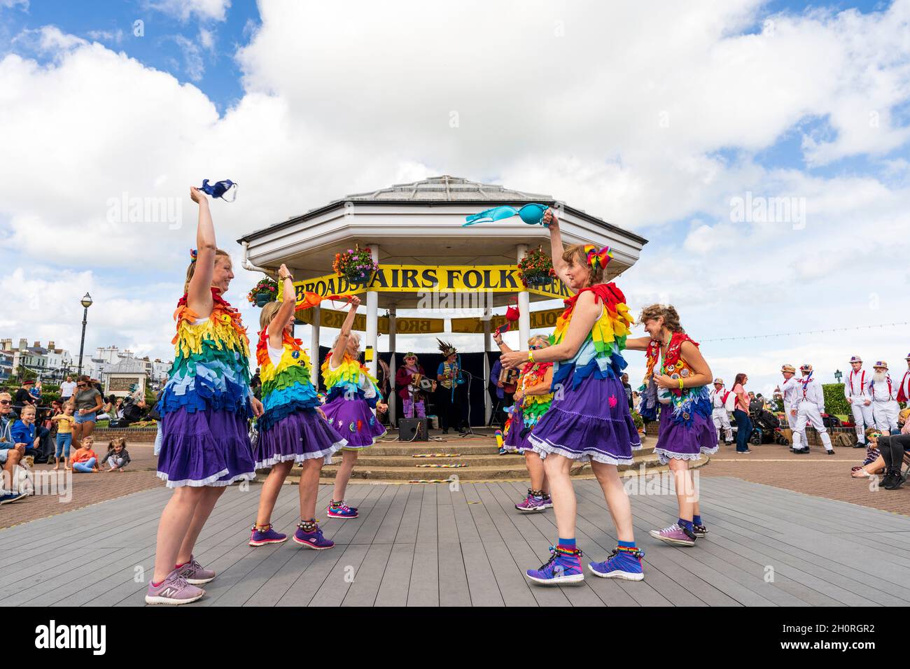 English folk dancers, the Loose Women Morris slide dancing while