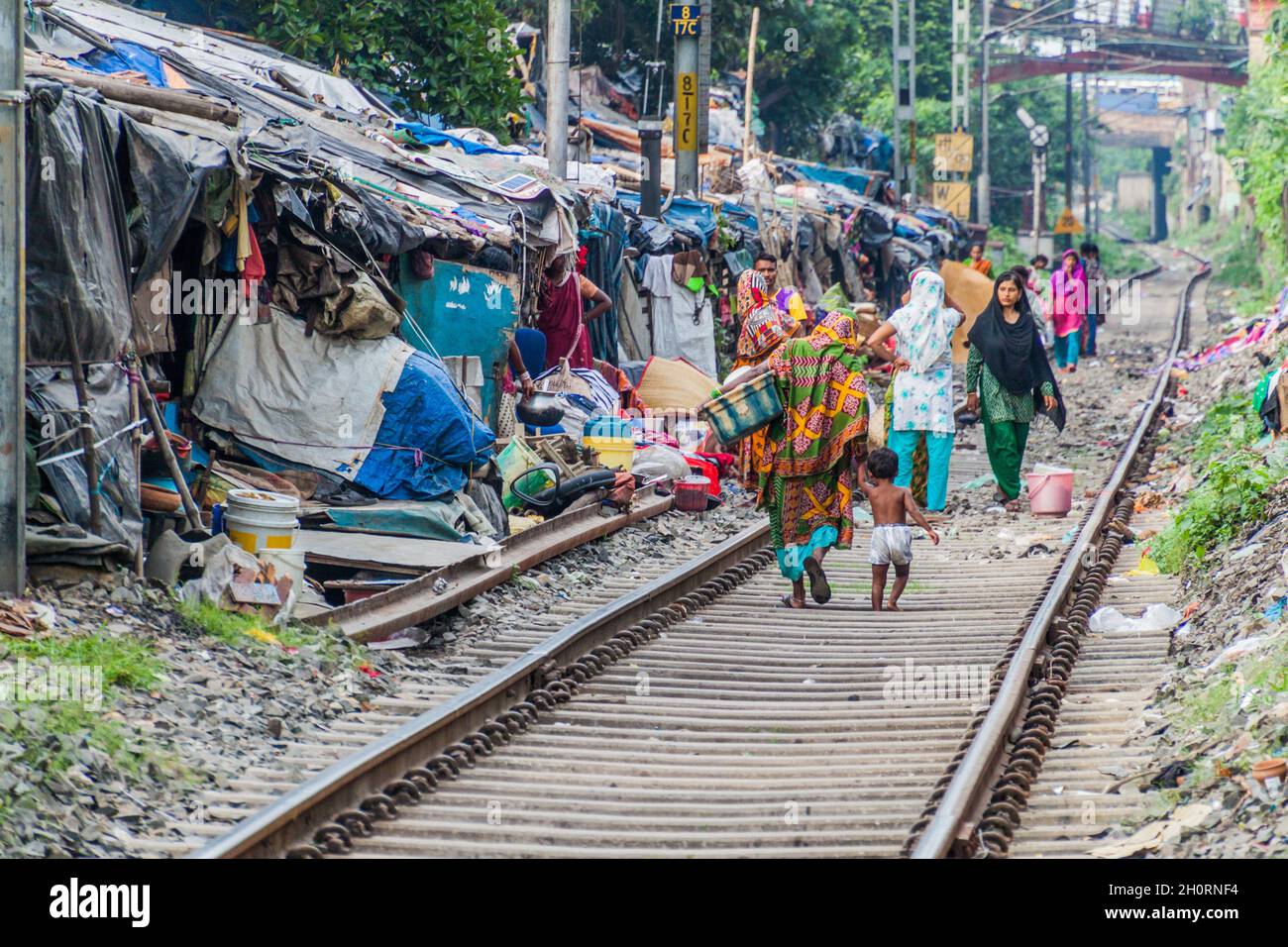 KOLKATA, INDIA - OCTOBER 31, 2016: Railway track and a slum in the center of Kolkata, India Stock Photo