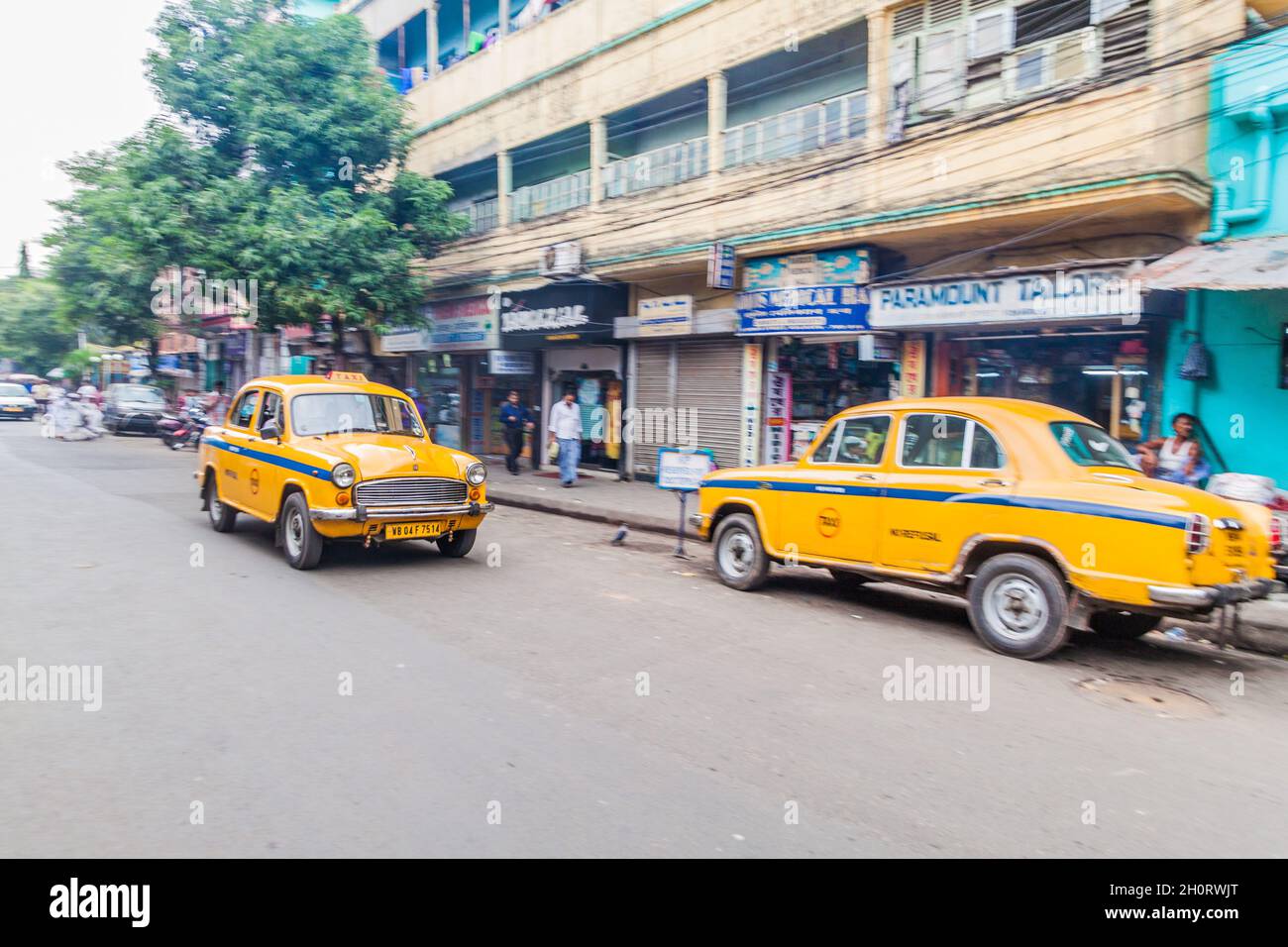 KOLKATA, INDIA - OCTOBER 27, 2016: View of yellow Hindustan Ambassador taxis in the center of Kolkata, India Stock Photo