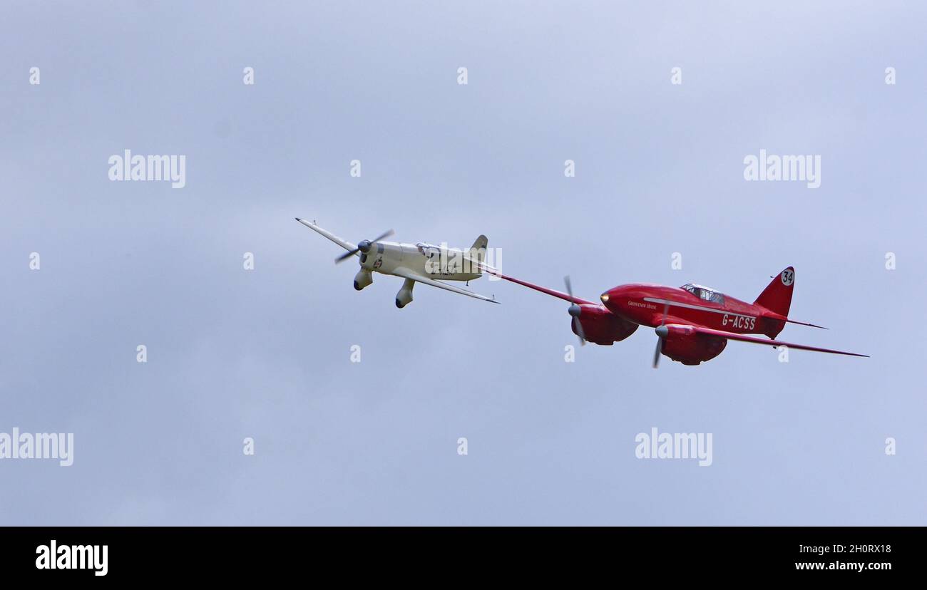 Vintage DH88 Comet De Havilland  and 1936 Percival Mew Gull  Aircraft  in flight. Stock Photo