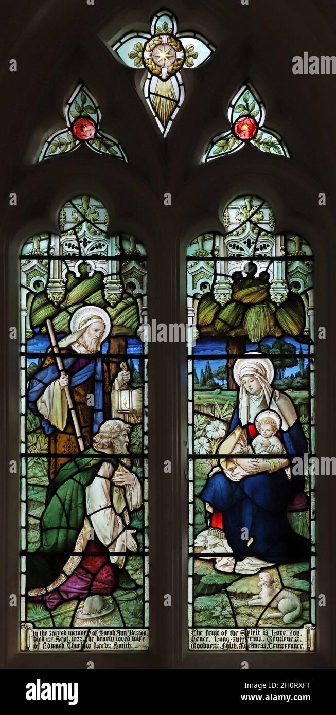 Stained glass window of 1922 by Percy Bacon depicting the Adoration of the Shepherds, St Swithun's Church, Sandy, Bedfordshire Stock Photo