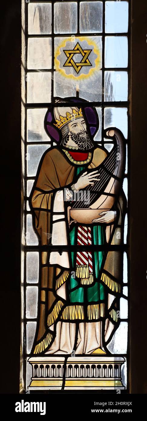 Stained glass window designed by George Cooper Abbs and made by Wippell & Co, King David, St Peter's Church Budleigh Salterton Stock Photo