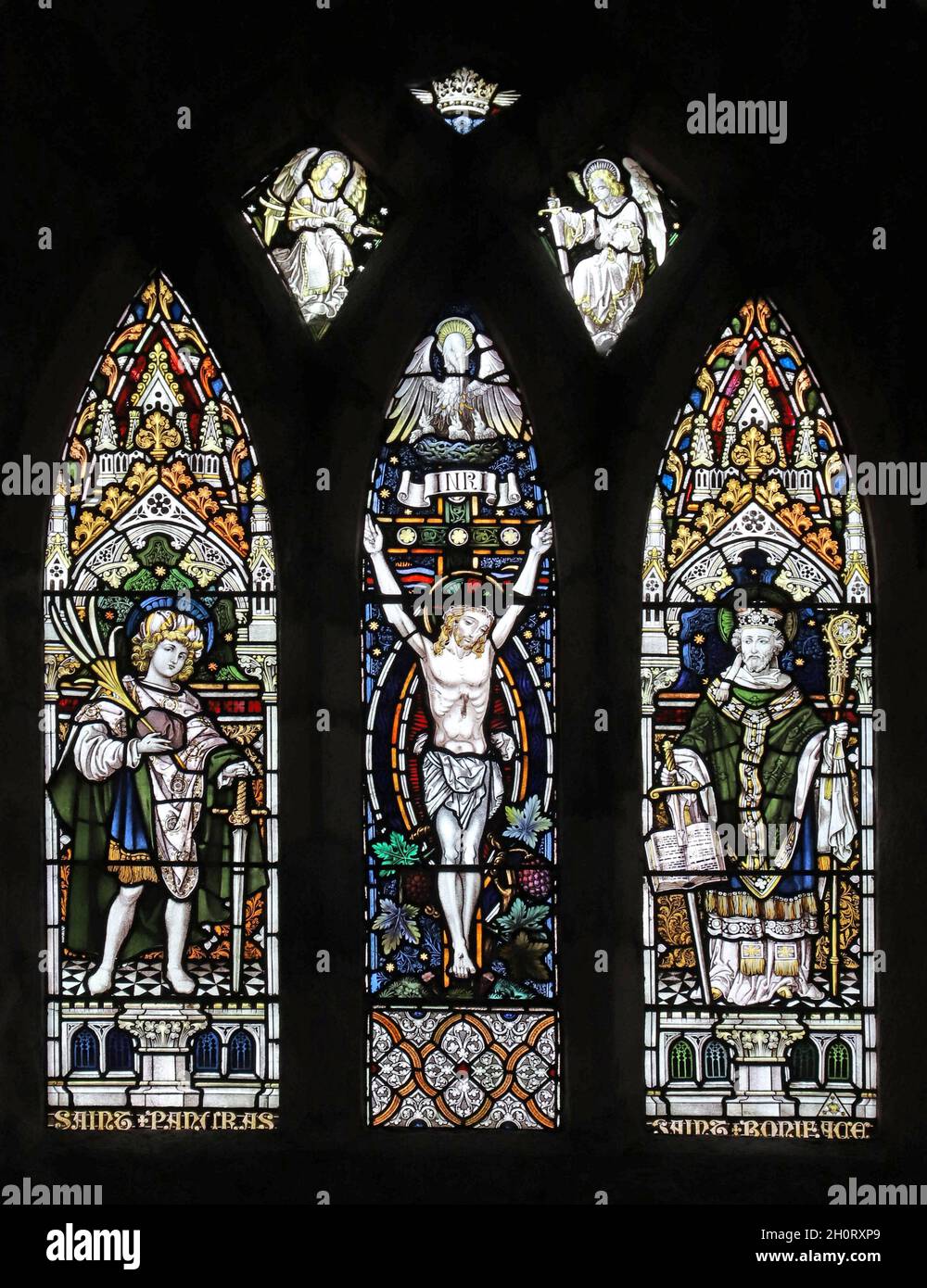 Stained glass window of 1895 by Percy Bacon & Brothers depicting the crucifixion, St Pancras and St Boniface, St Pancras Church, Exeter, Devon Stock Photo