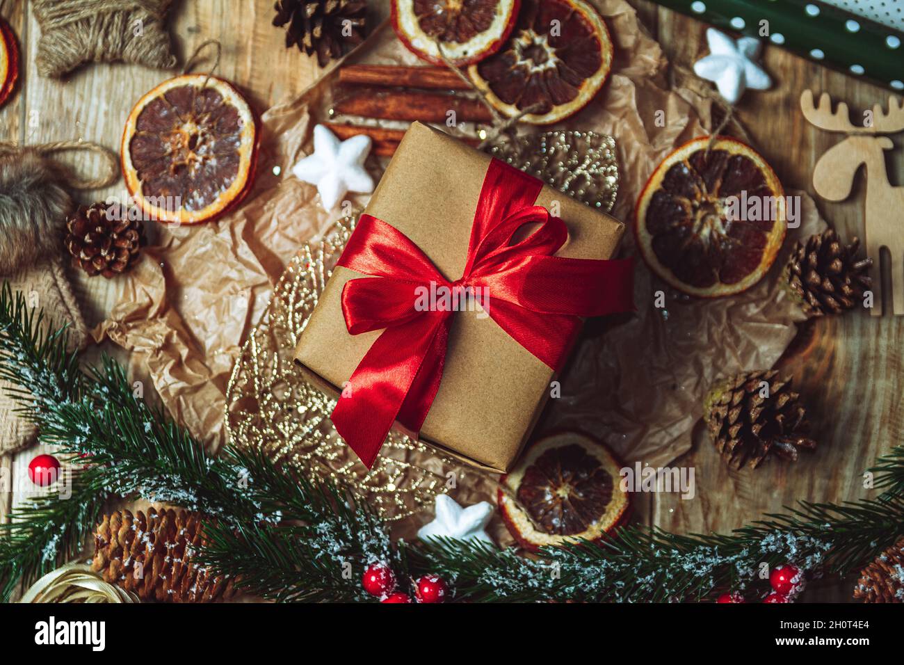 Christmas accessories and new year gift on wooden background Stock Photo