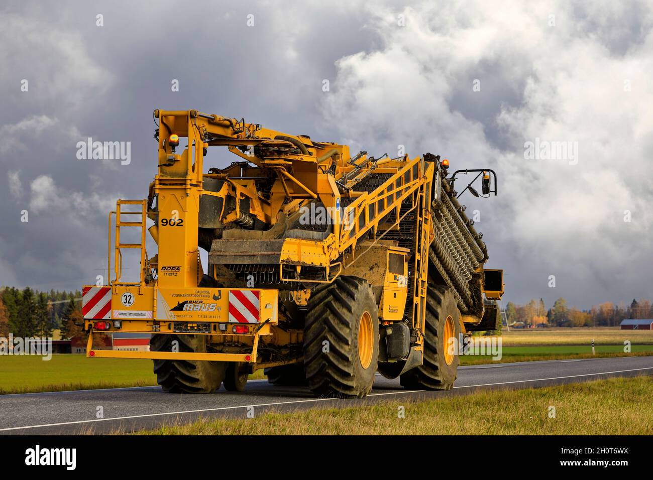 ROPA euro-Maus 4, self-propelled cleaner loader for sugar beet with a 10.20 m wide pick-up system on road in autumn. Jokioinen, Finland. Oct 16, 2020. Stock Photo