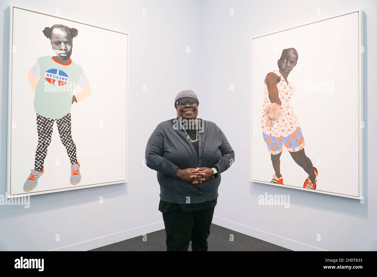 London, UK, 14 October 2021: Frieze art fair opens in London with contemporary art from around the world. American artist Deborah Roberts has a presentation of her distinctive style of paintings using collage and mixed media. Anna Watson/Alamy Live News Stock Photo