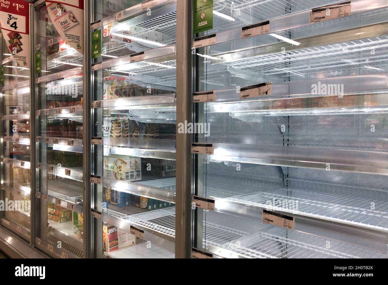 Empty shelves of frozen turkey and stuffing balls in the freezer aisle