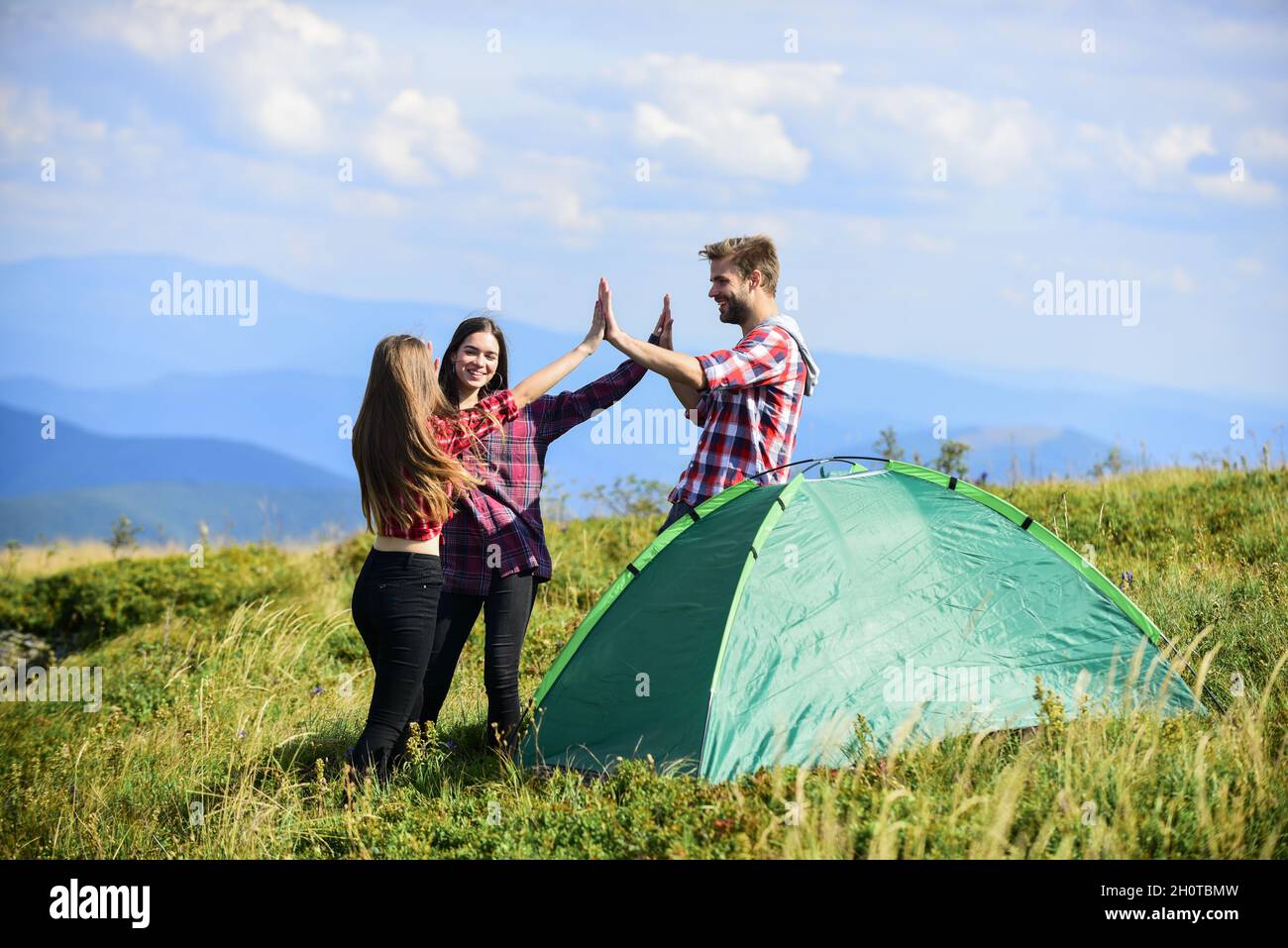 Well done. Camping gear. Camping tent. Good job. Teamwork concept