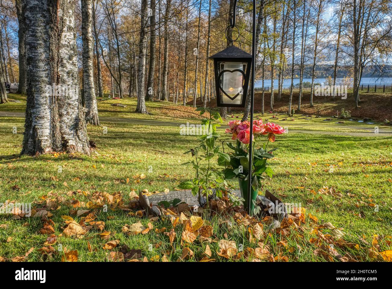 Graveyard in Autumn landscape Stock Photo