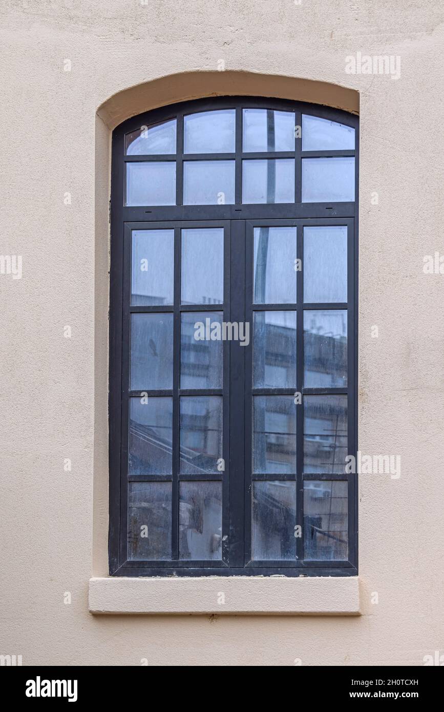 Black Window Frame at White Building Exterior Stock Photo