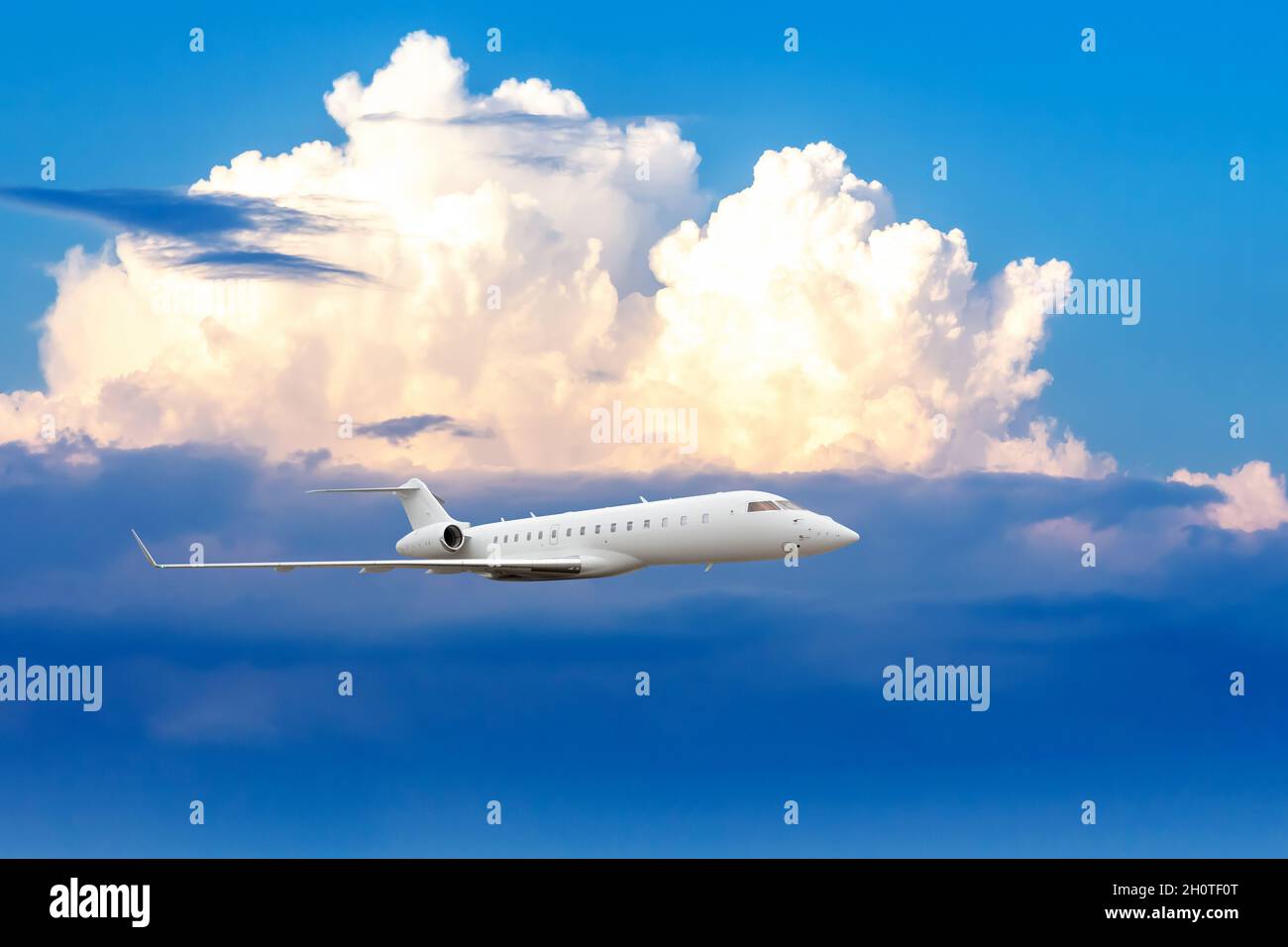 Business jet flying on clouds hi-res stock photography and images - Alamy