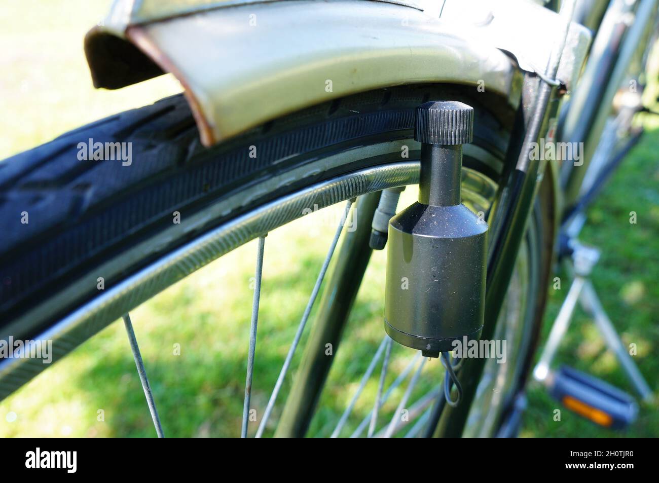 Closeup shot of a bicycle dynamo Stock Photo