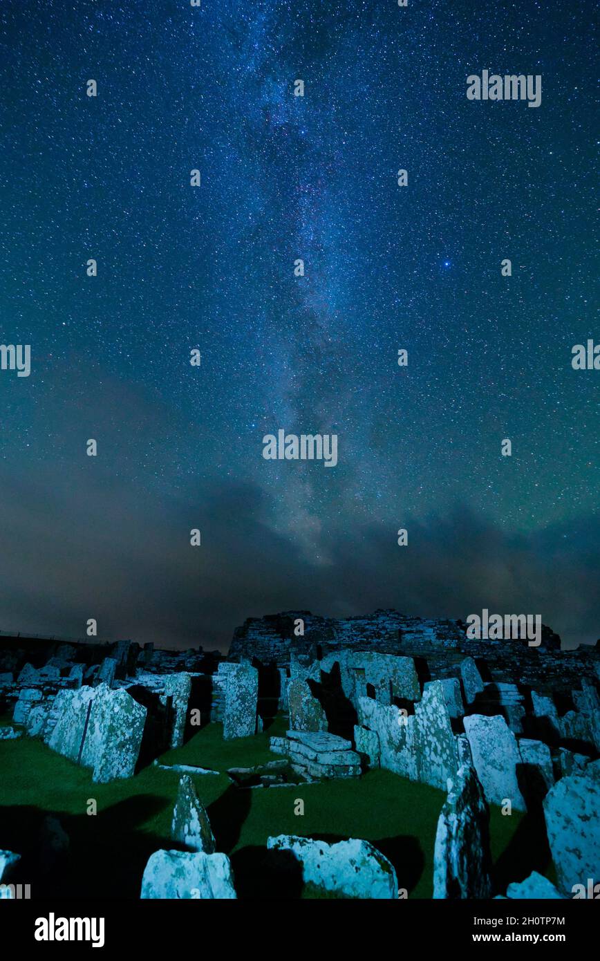 Broch of Gurness with Milky Way in night sky, Orkney Isles Stock Photo