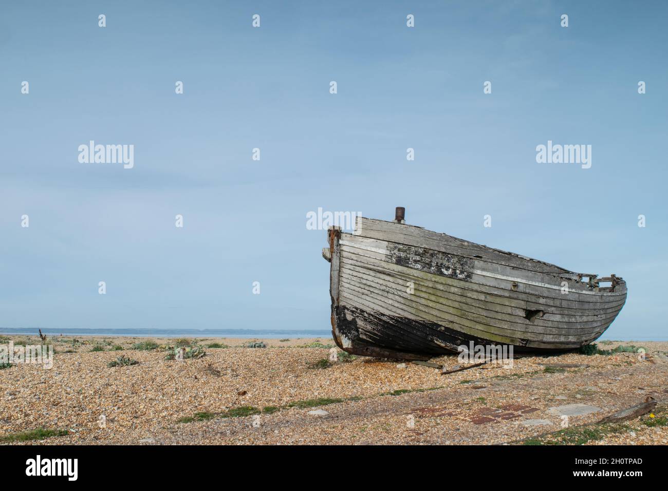 Abandoned wooden fishing boat wreck at the beach of Dungeness, Kent ...