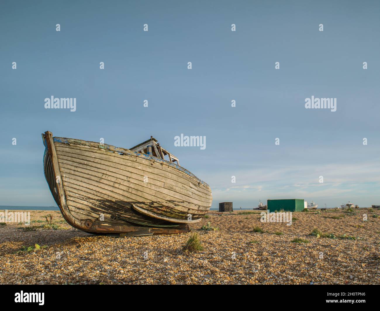 Abandoned wooden fishing boat wreck at the beach of Dungeness, Kent ...