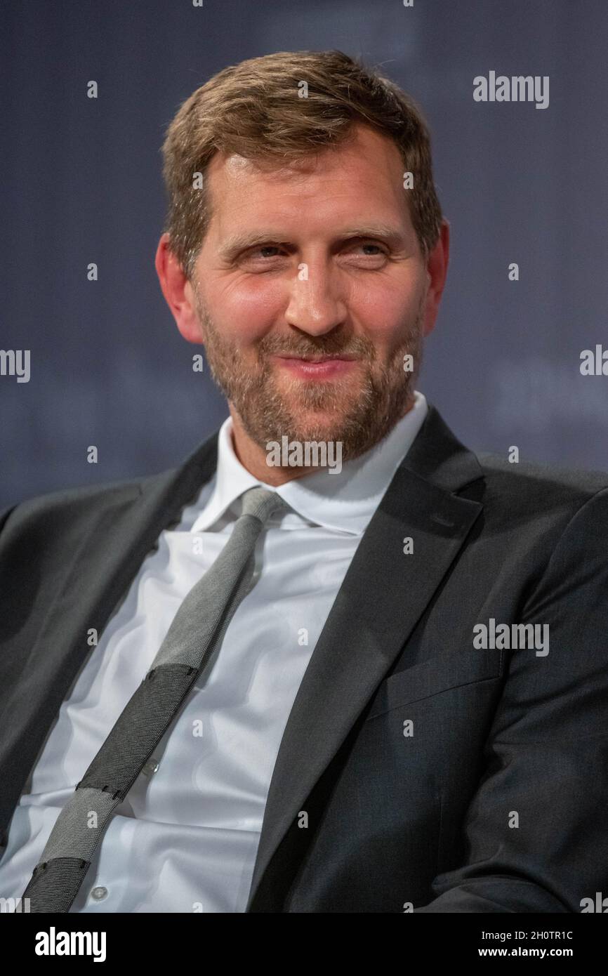 Passau, Germany. 14th Oct, 2021. Basketball star Dirk Nowitzki sits on  stage in the media center of the Passau Neue Presse (PNP) publishing group.  Nowitzki is a guest as part of the