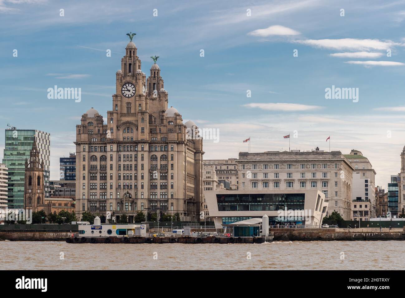 Royal Liver Building and Mersey Ferry Terminal from the Mersey Ferry, Liverpool, Merseyside, UK. Stock Photo