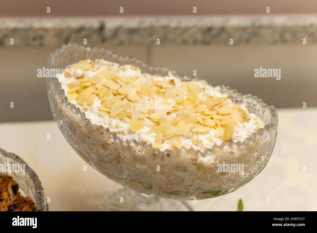A creamy pate with chestnut chips on a buffet table. Stock Photo