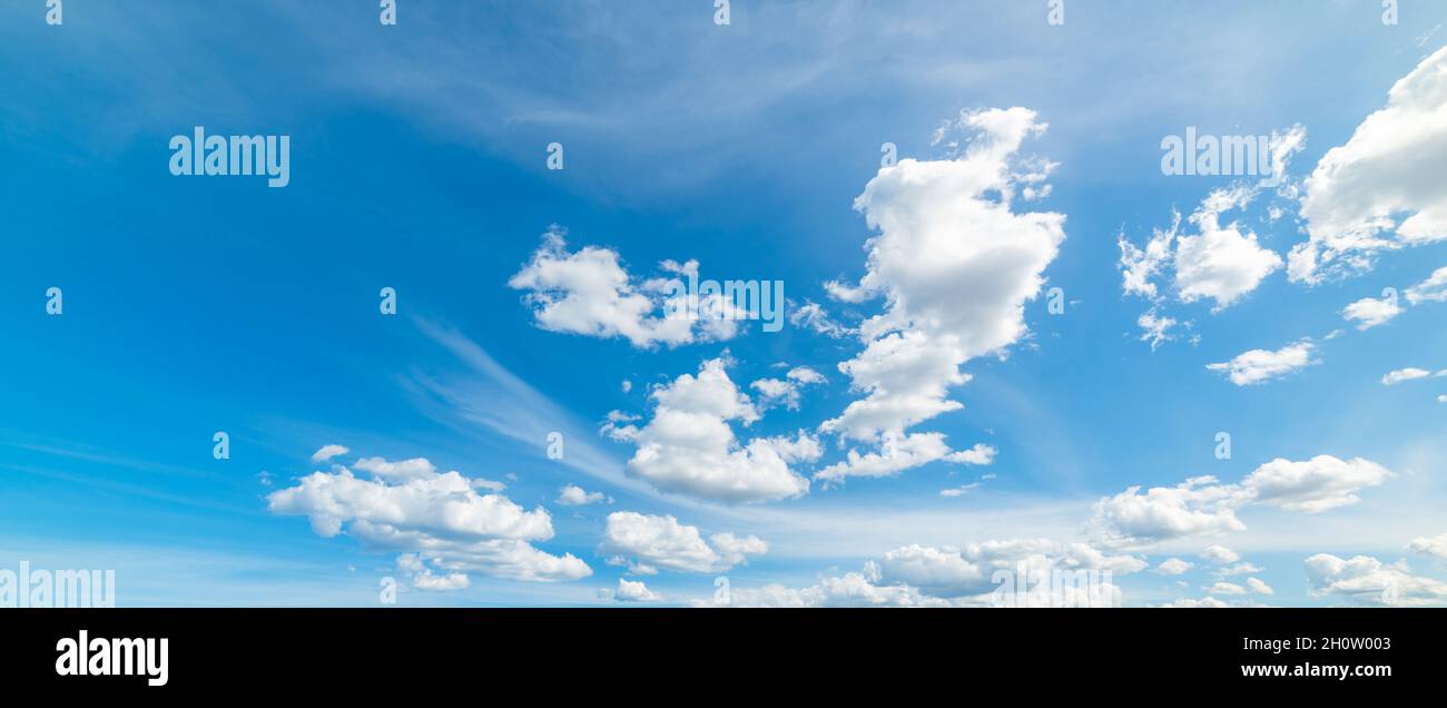 Blue sky with white clouds in summer Stock Photo - Alamy