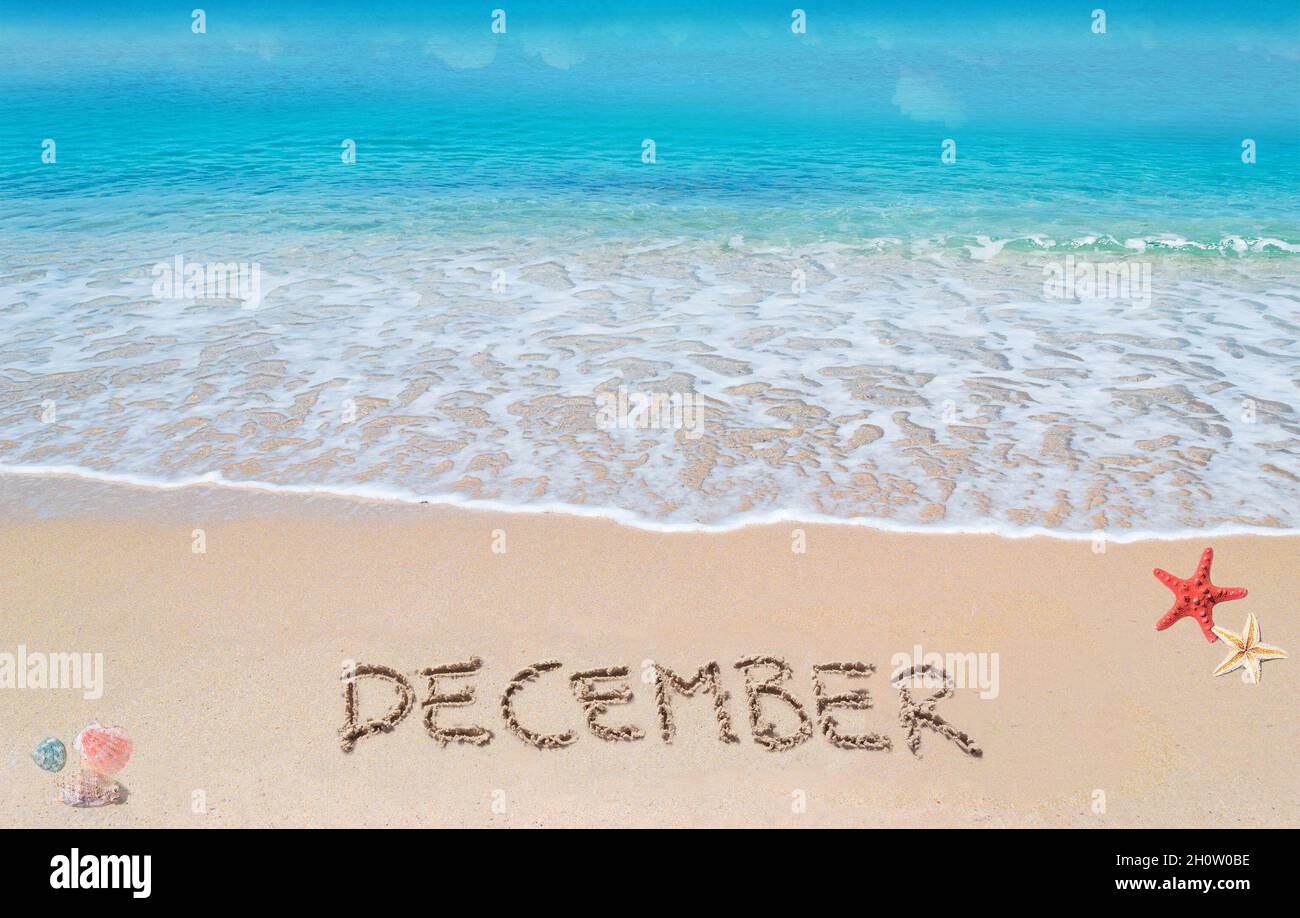 December written on a tropical beach Stock Photo - Alamy