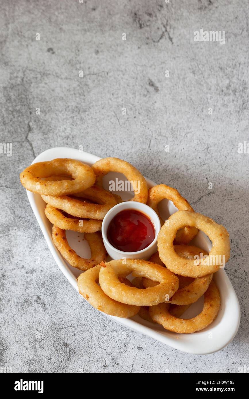 Deep fried battered onion rings hi-res stock photography and images - Alamy