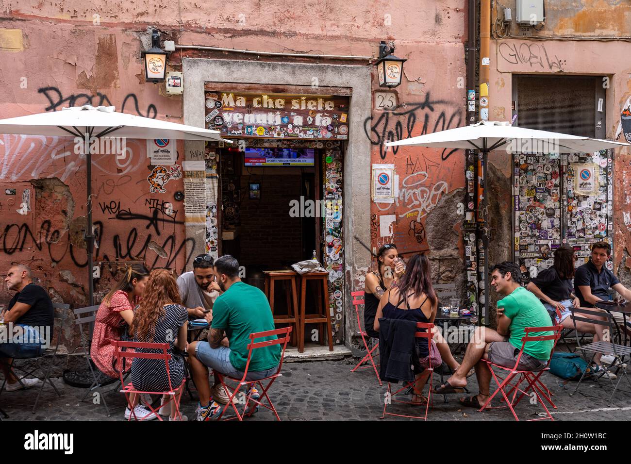 People enjoying craft beer in front of Ma Che Siete Venuti A Fà, a
