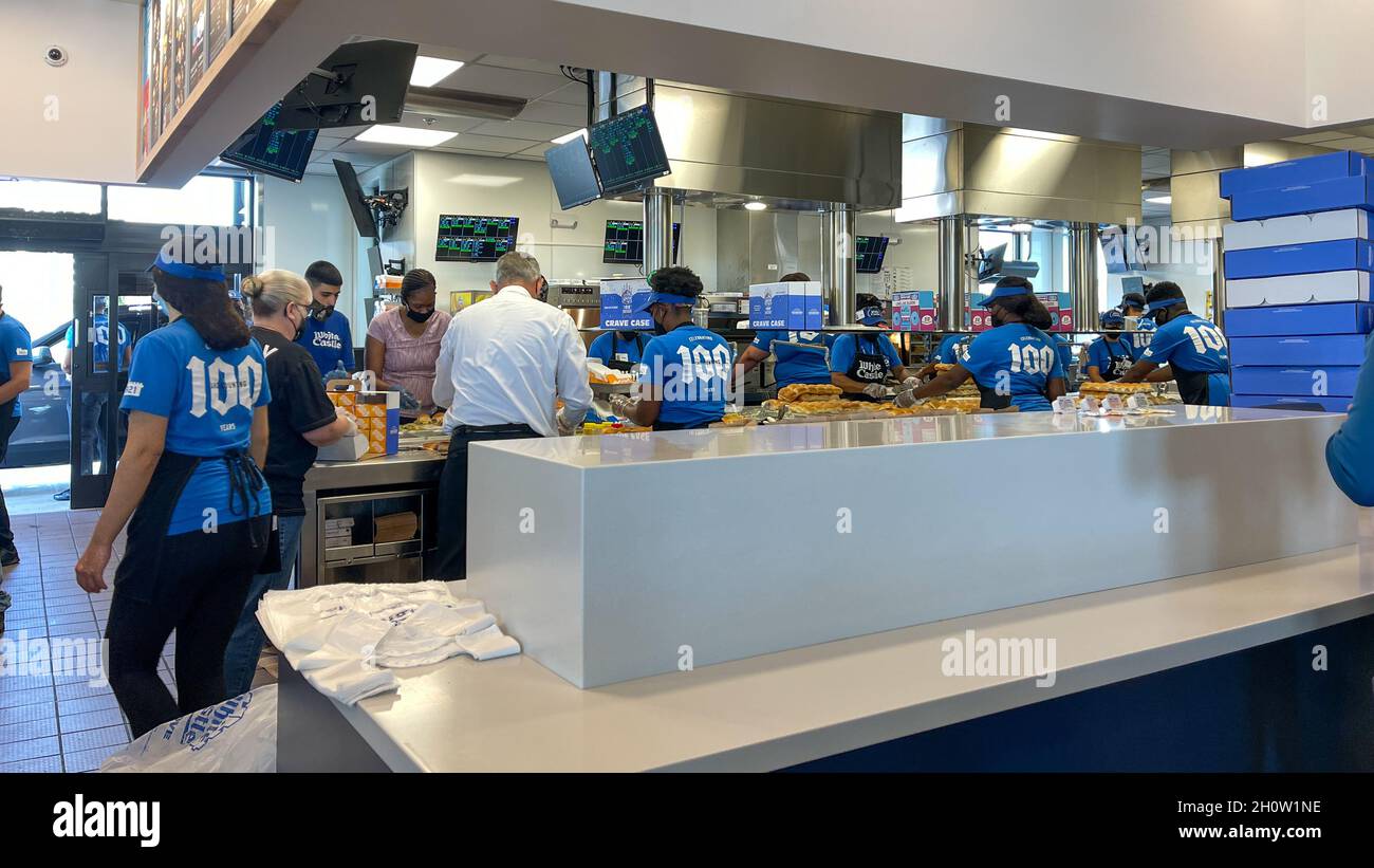 Orlando, FL USA -  June 8, 2021: The interior of a White Castle fast food restaurant with employees serving food in Orlando, Florida. Stock Photo