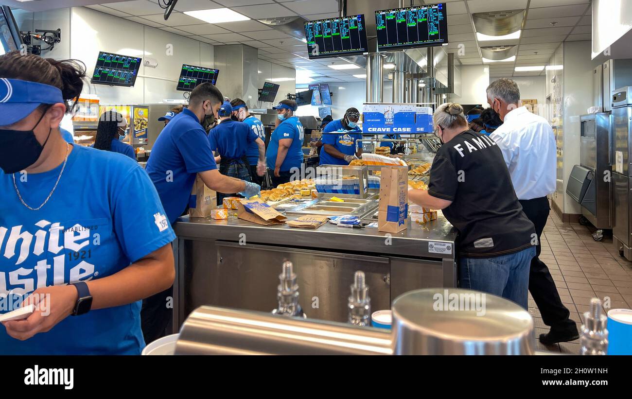 Orlando, FL USA -  June 8, 2021: The interior of a White Castle fast food restaurant with employees serving food in Orlando, Florida. Stock Photo