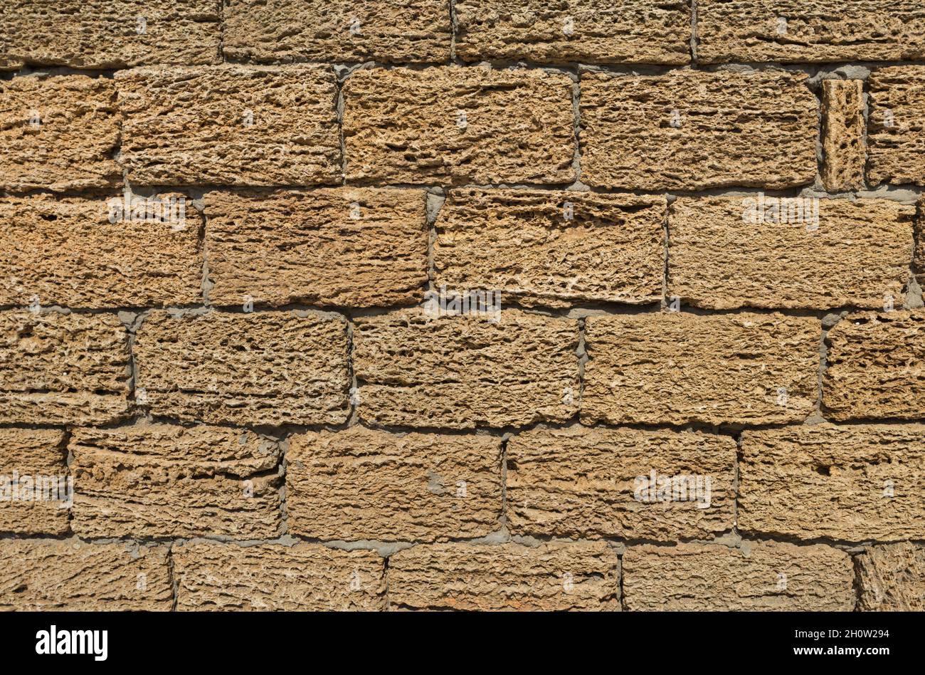 Coquina, shell house limestone wall textured background. Shell rock brick wall. Natural background. Stock Photo