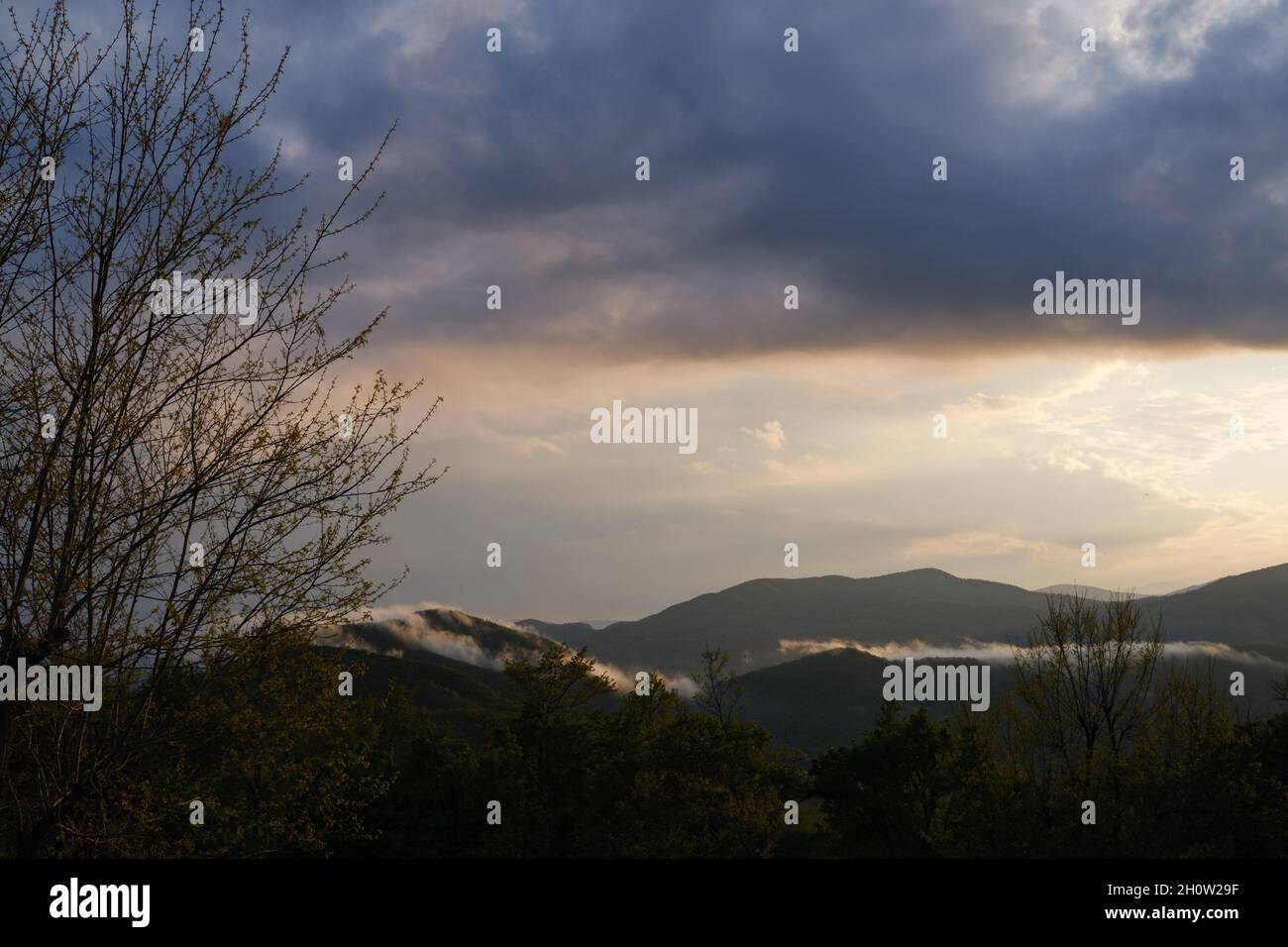 Sunset in mountain Stock Photo - Alamy
