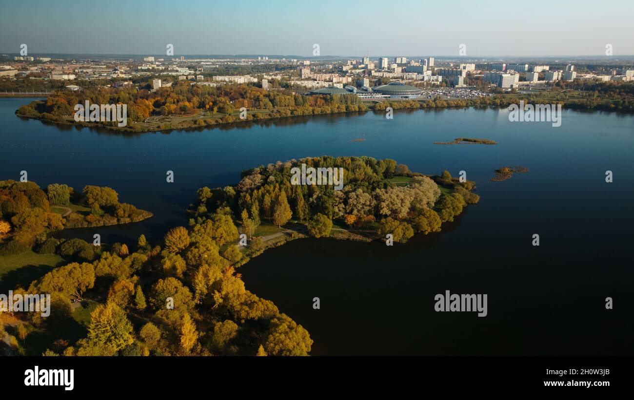 Flight over the autumn park. Trees with yellow autumn leaves are ...