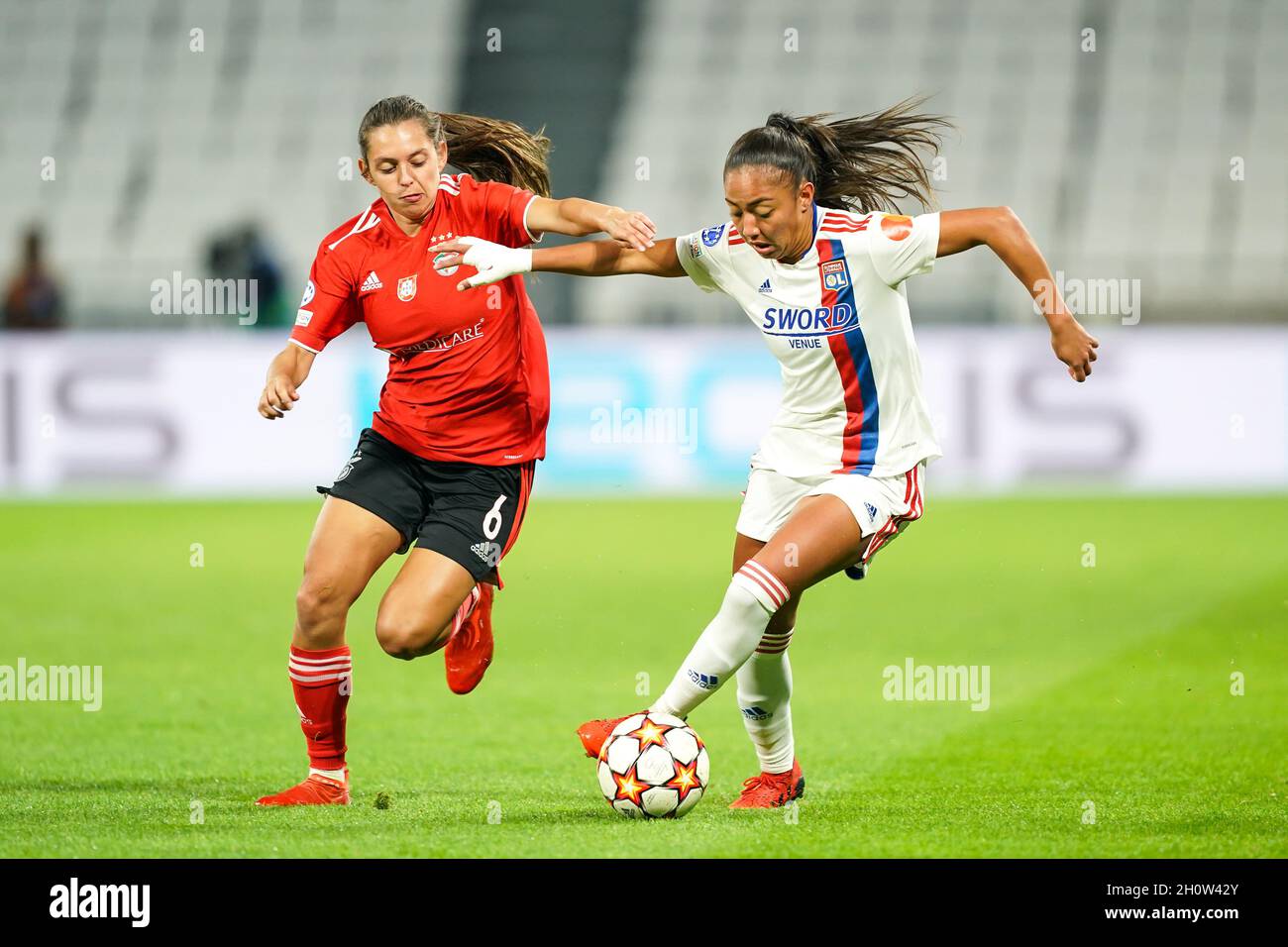 Lyon, France. 14th Oct, 2021. Selma Bacha (4 Lyon) and Andreia Faria (6  Benfica Lisbon) battle for the ball (duel) during the UEFA Womens Champions  League Group stage round 2 football match