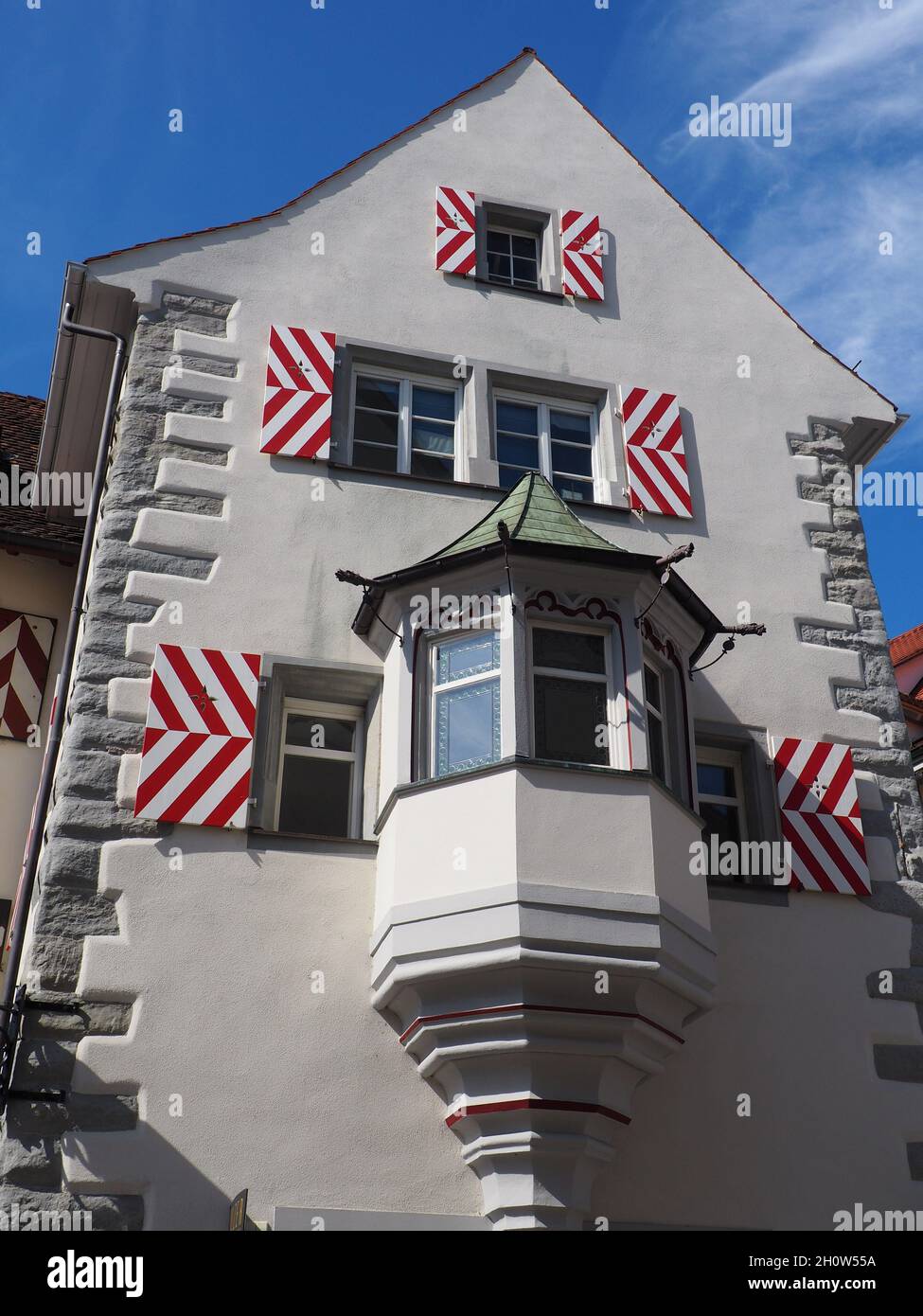 Low angle vertical shot of a white building facade Stock Photo - Alamy