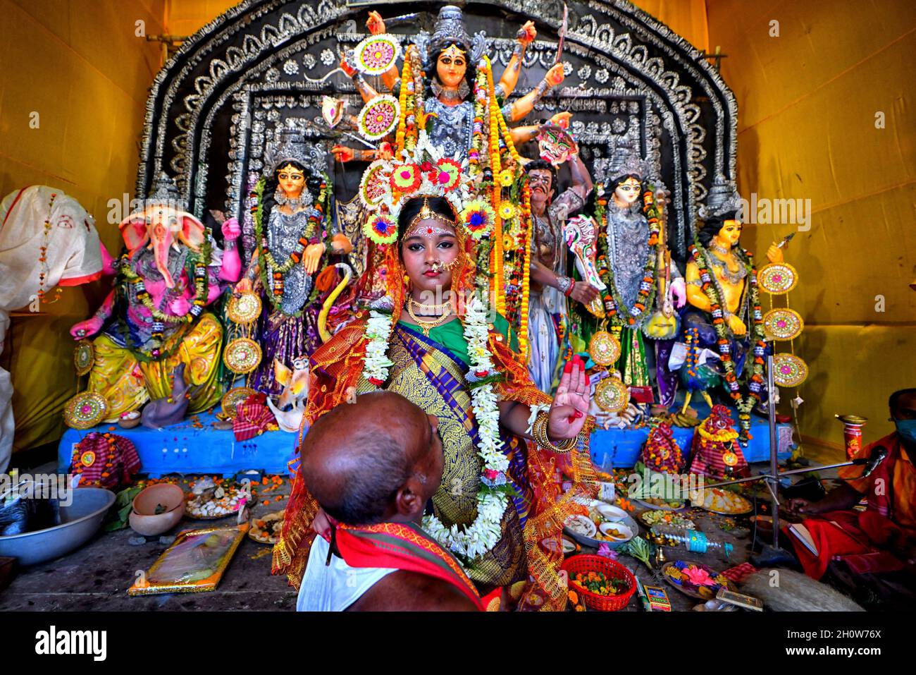 Kolkata, India. 14th Oct, 2021. A little girl Dipwantita Adhikary of 10 ...