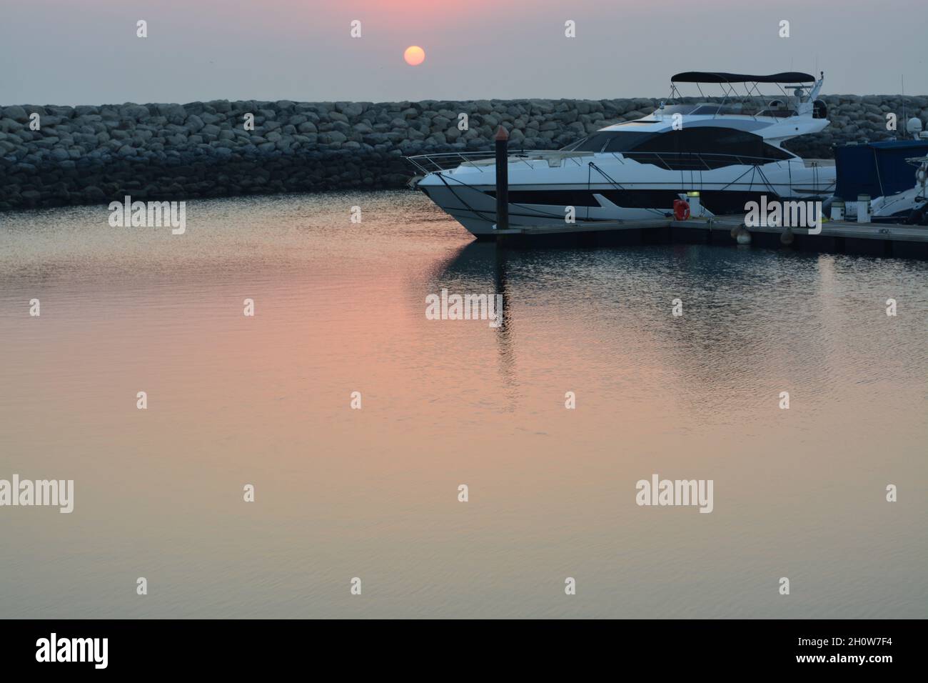 Sunrise in middle east. Boat in the marine Stock Photo