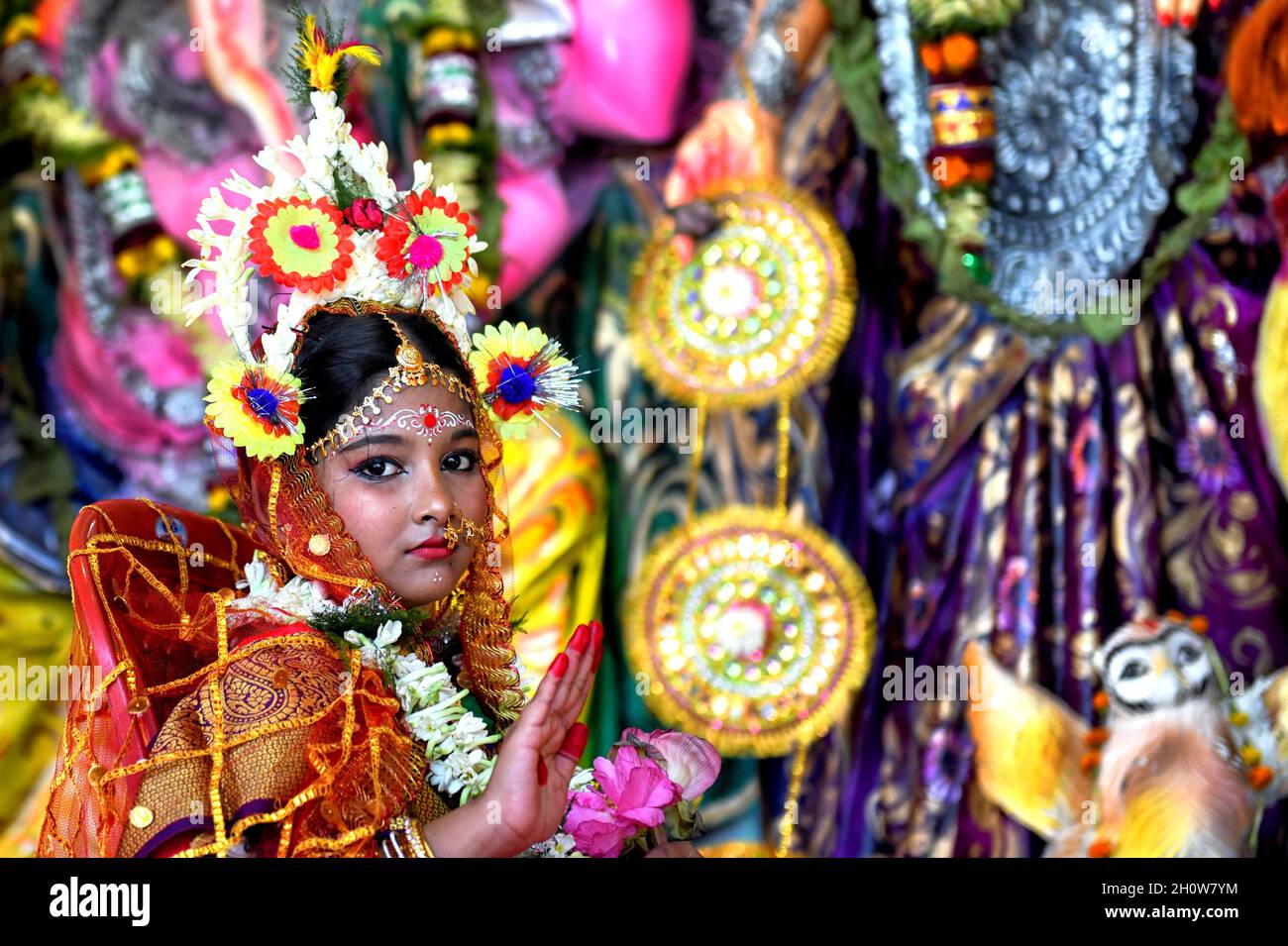 Kolkata, India. 14th Oct, 2021. A little girl Dipwantita Adhikary poses