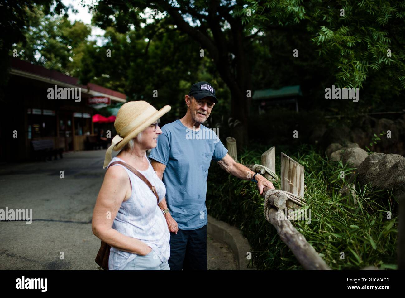 Man with Dementia Standing with Wife at the Cincinnati Zoo Stock Photo