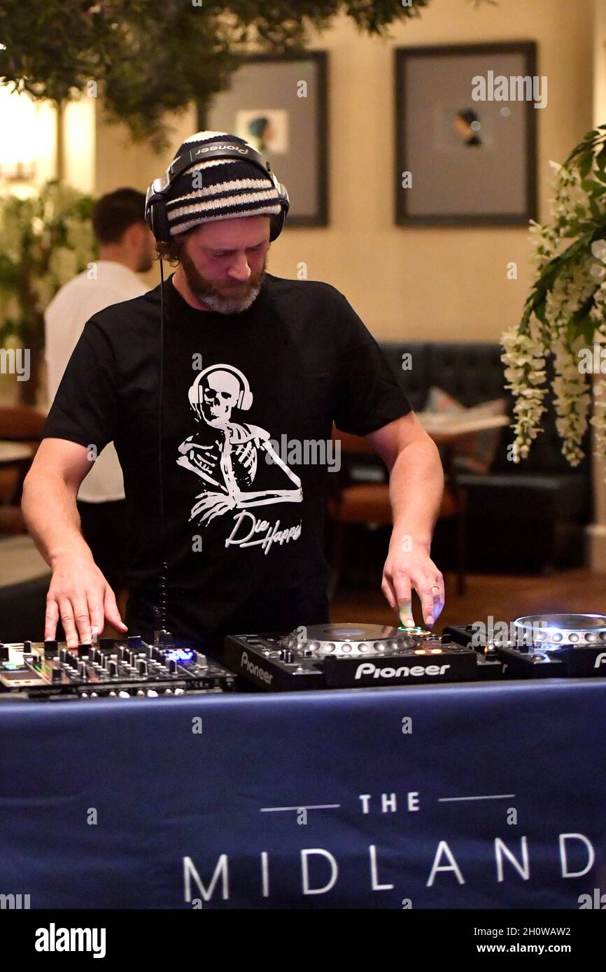 EDITORIAL USE ONLY Howard Donald DJs during the re-launch of the Midland, a Leonardo Royal Hotel, in Manchester following a £14m refurbishment project. Picture date: Thursday October 14, 2021. Stock Photo