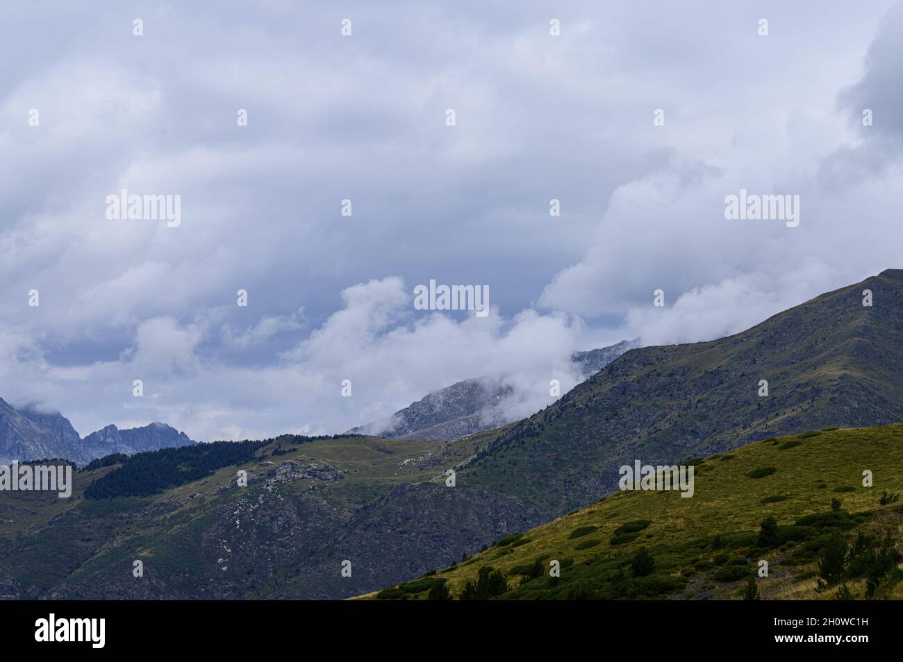 Aerial shot of beautiful mountains on a cloudy day Stock Photo - Alamy