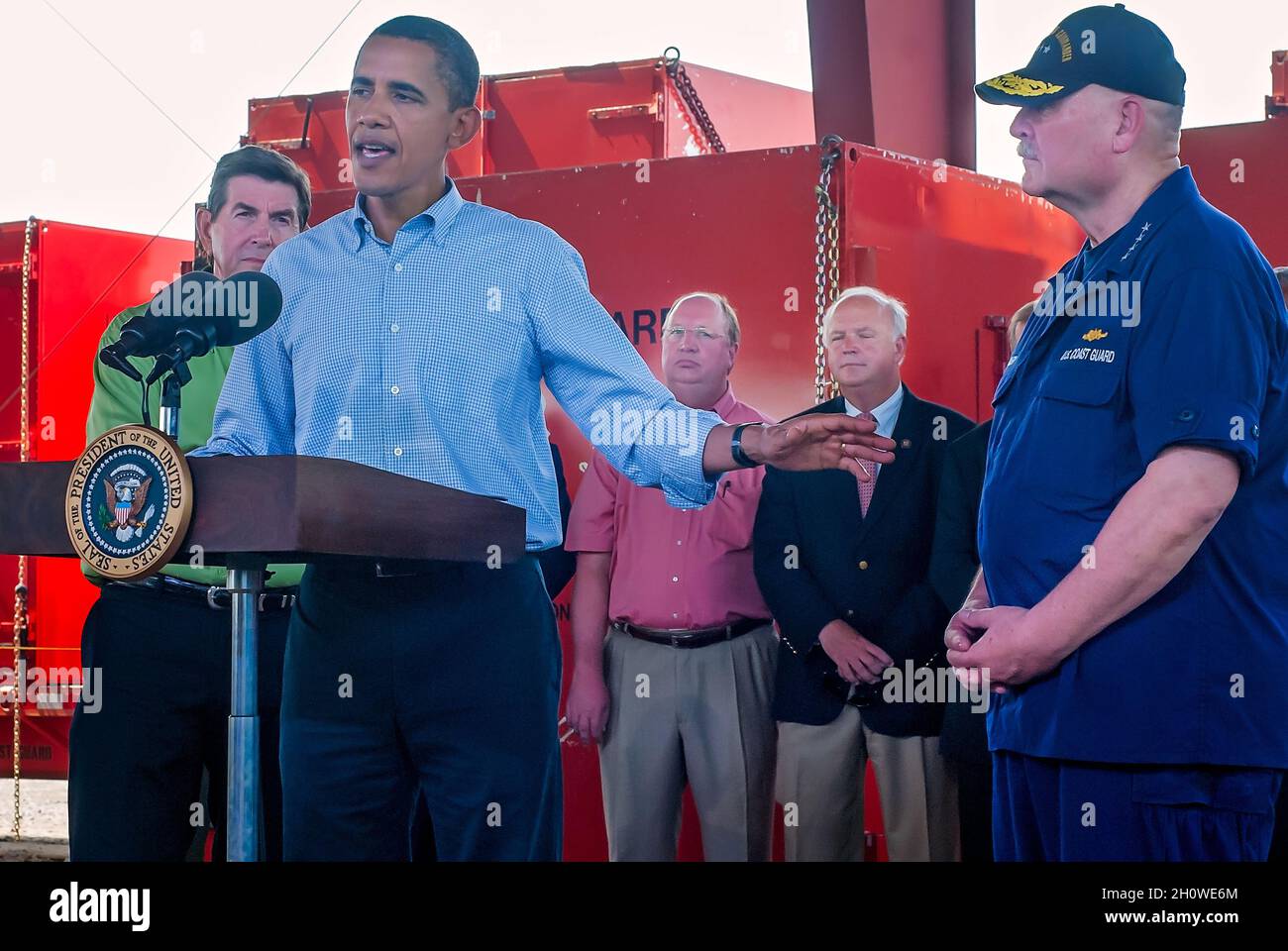 President Barack Obama motions to U.S. Coast Guard Adm. Thad Allen while speaking about the BP oil spill during a press conference in Theodore, Ala. Stock Photo