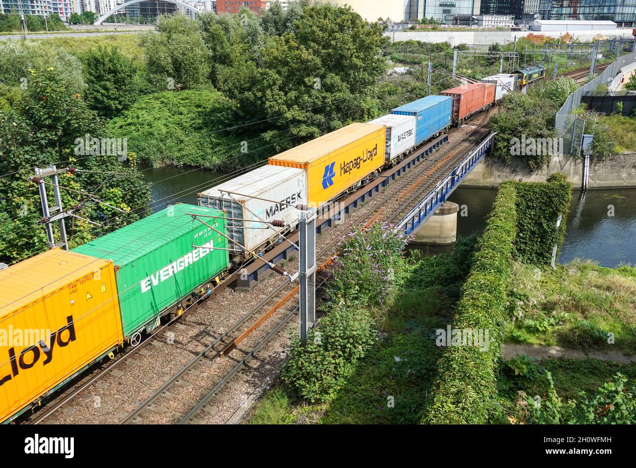 Shipping containers on container train in London England United Kingdom UK Stock Photo