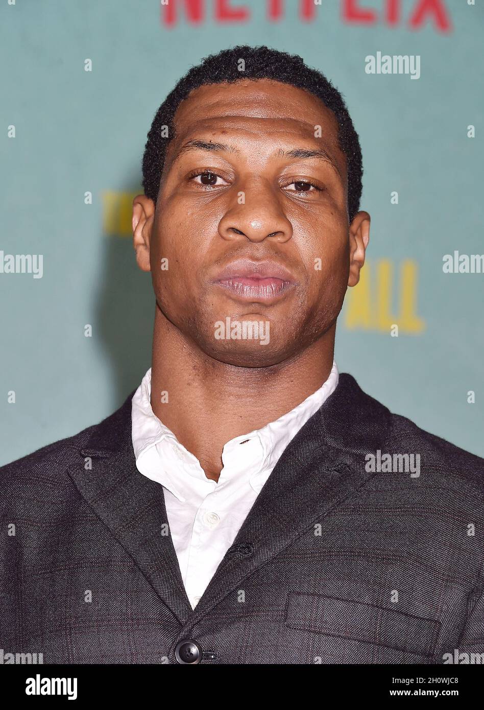 LOS ANGELES, CA - OCTOBER 13: Jonathan Majors attends a special screening of “The Harder They Fall” at the Shrine Auditorium and Expo Hall on October Stock Photo