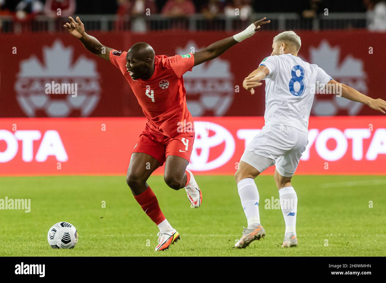 Toronto, Canada, October 13, 2021: Kamal Miller, No.4, of Team Canada in action against Cristian Martínez, No.8, of Team Panama during the CONCACAF FIFA World Cup Qualifying 2022 match at BMO Field in Toronto, Canada. Canada won the match 4-1. Credit: Phamai Techaphan/Alamy Live News Stock Photo