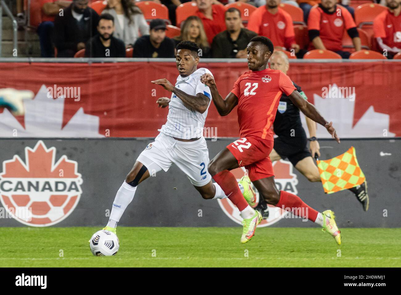Toronto, Canada, October 13, 2021: Richie Laryea, No.22, of Team Canada competes for the ball against Cesar Blackman, No.2, of Team Panama during the CONCACAF FIFA World Cup Qualifying 2022 match at BMO Field in Toronto, Canada. Canada won the match 4-1. Credit: Phamai Techaphan/Alamy Live News Stock Photo
