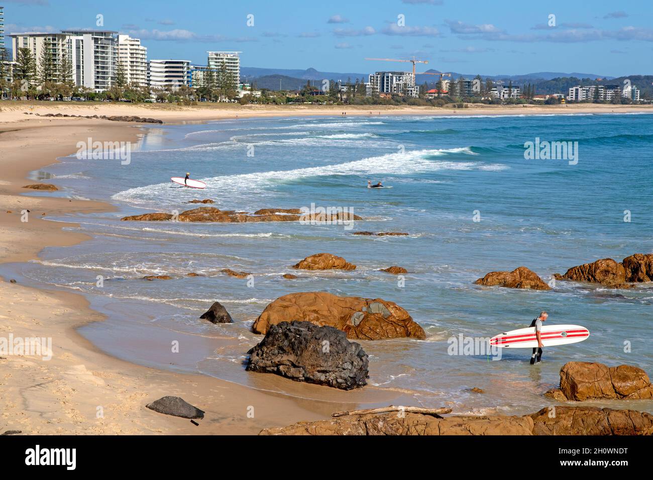 Surfers at Kirra Stock Photo