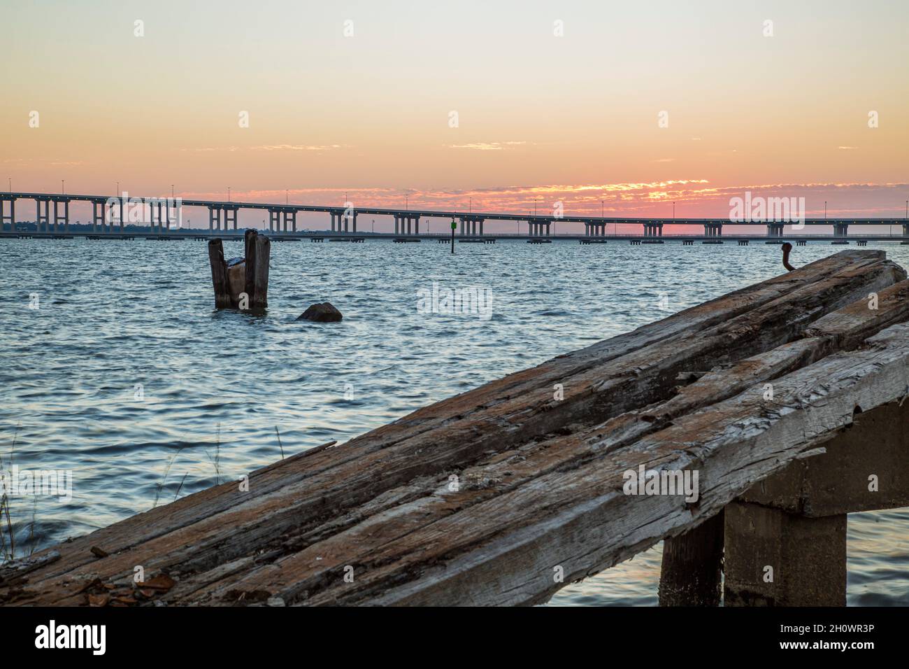 Biloxi Bay Bridge behind the remains of an old gantry crane track on the Back Bay in Biloxi
