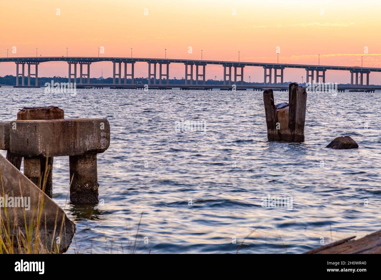 Biloxi Bay Bridge behind the remains of an old gantry crane track on the Back Bay in Biloxi