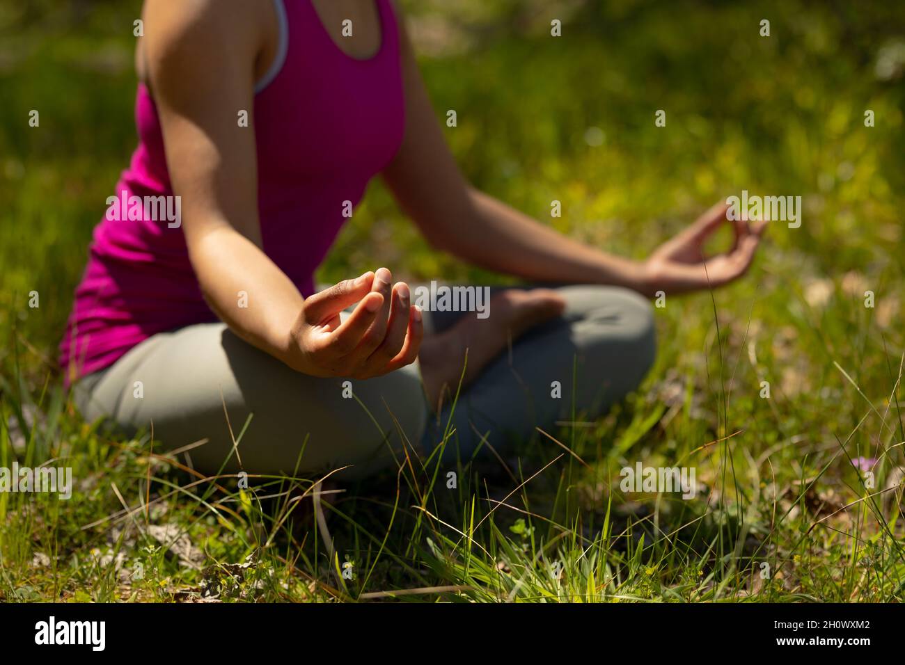Beautiful woman sitting crossed legs hi-res stock photography and ...